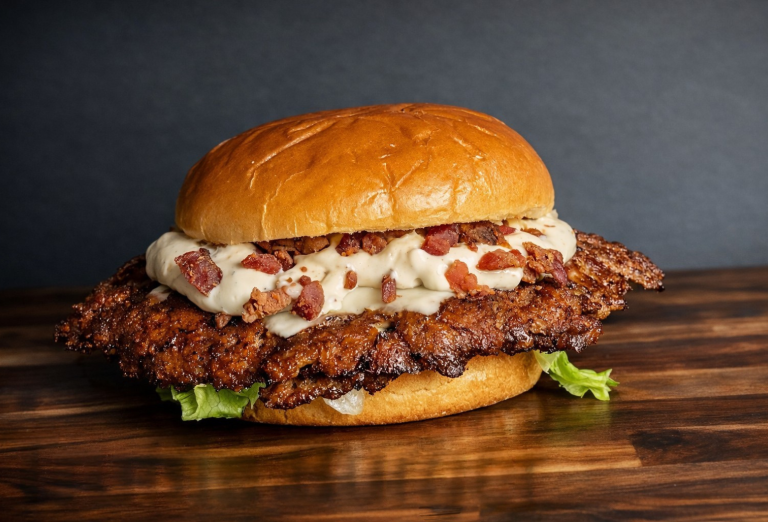 Truffle burger with Swiss cheese, bacon crumbles, and black winter truffle aioli from a Holland Michigan food truck